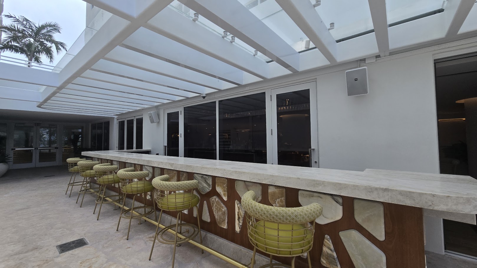 Pool Bar Terrace with Green Stools