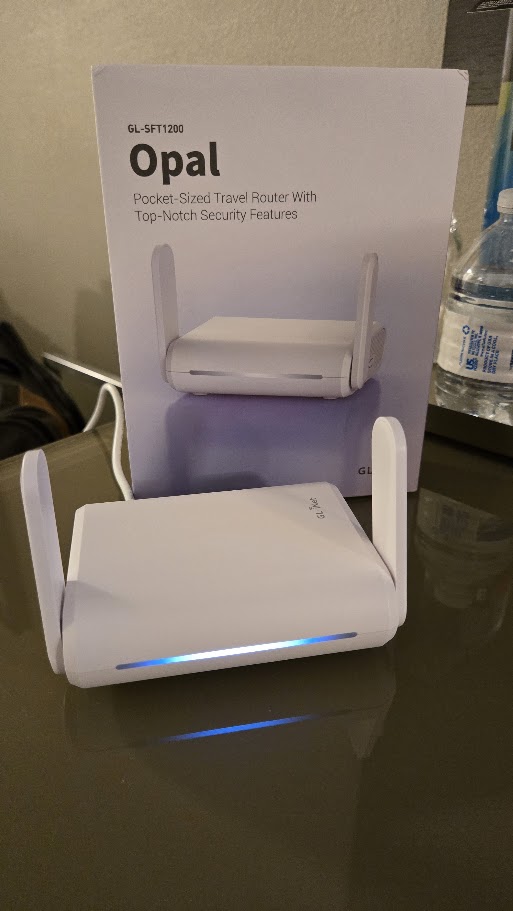 GL.iNet GL-SFT1200 Opal Travel Router and Box